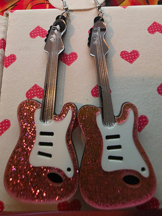 Large dangle guitars