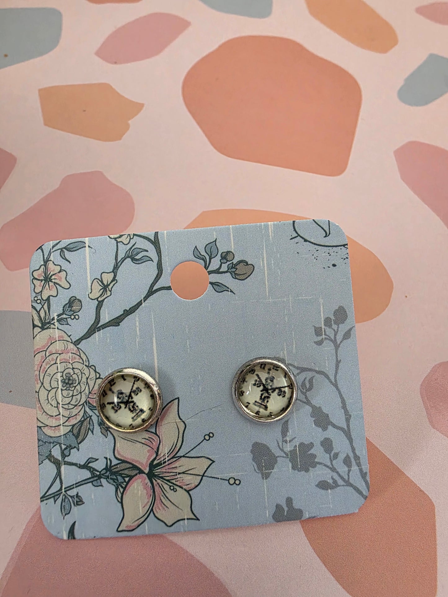 Small clock studs